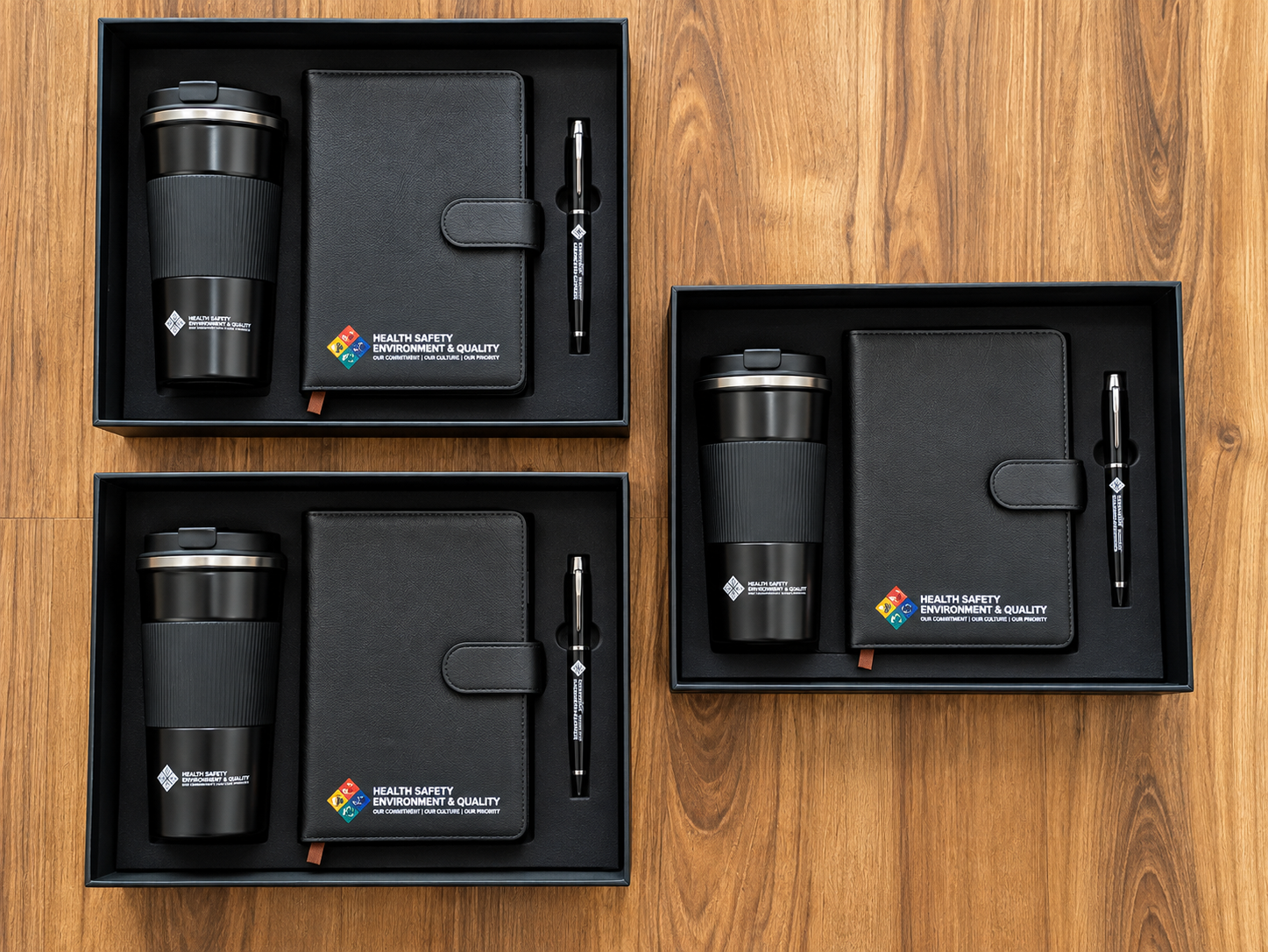 Customized journal, tumbler and pen with company logo