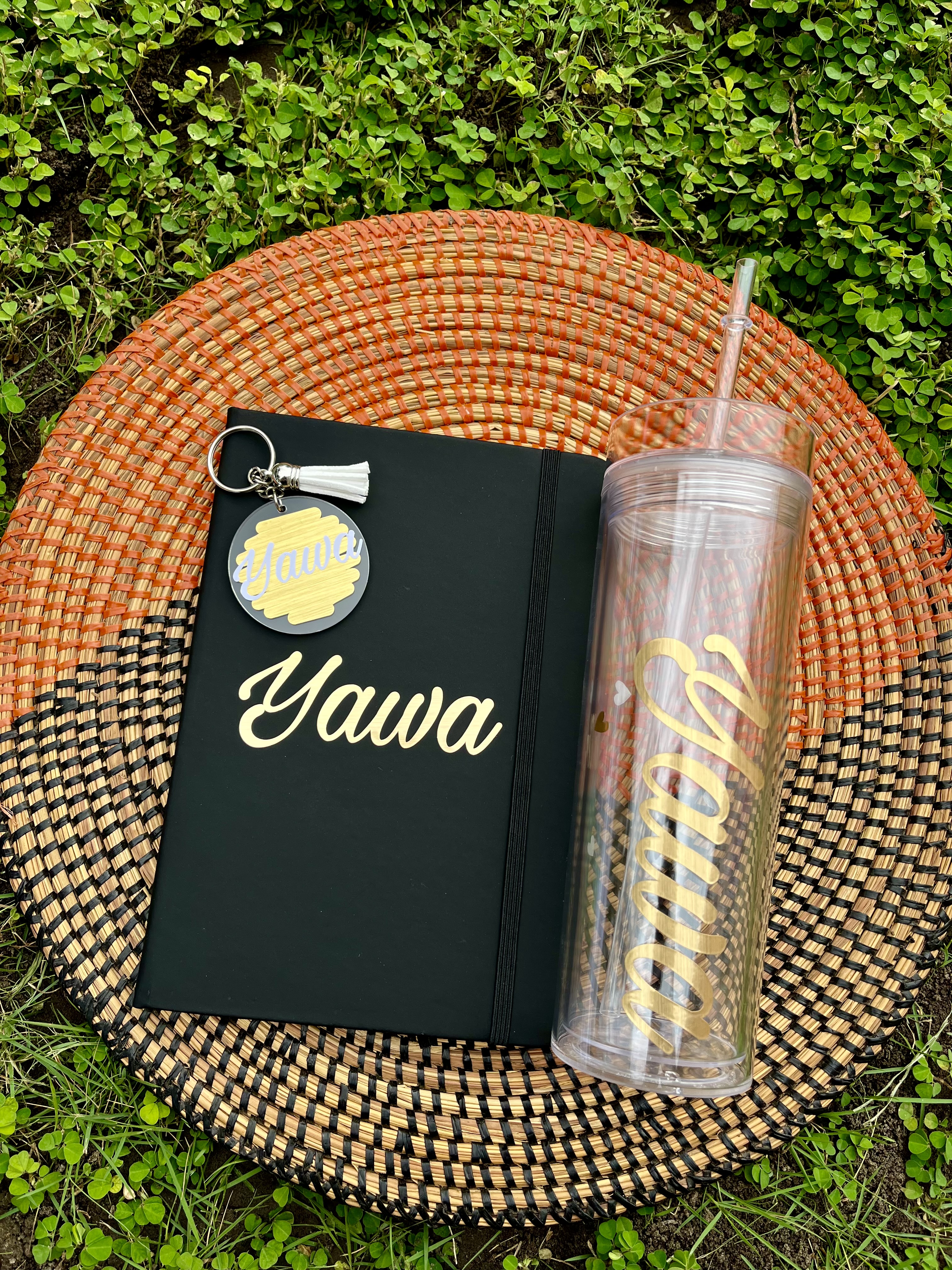 Customized journal, glass bottle and keychain with Yawa